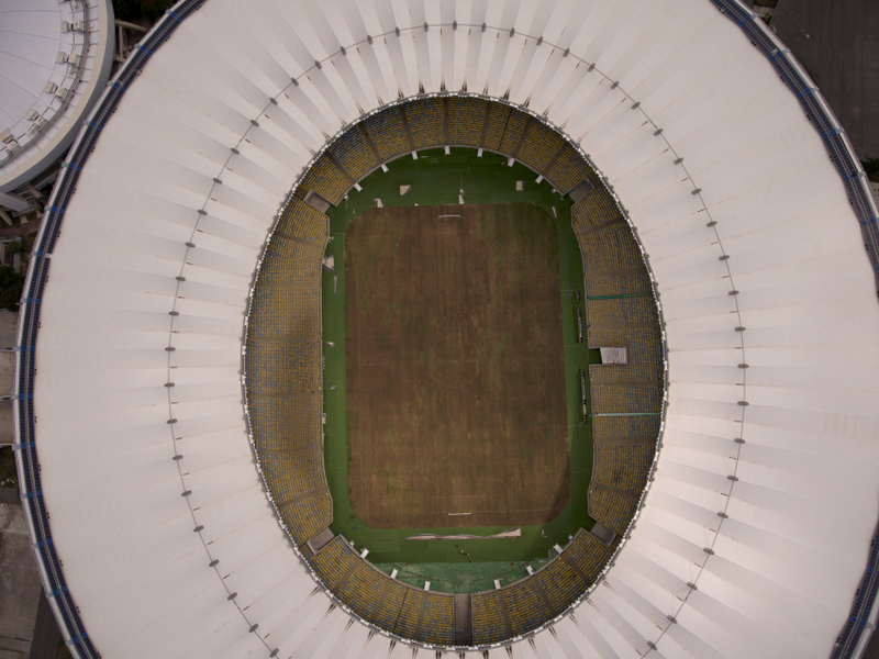 Aerial photo of the Maracanã stadium shows dead grass and filthy seats (Image: AP)